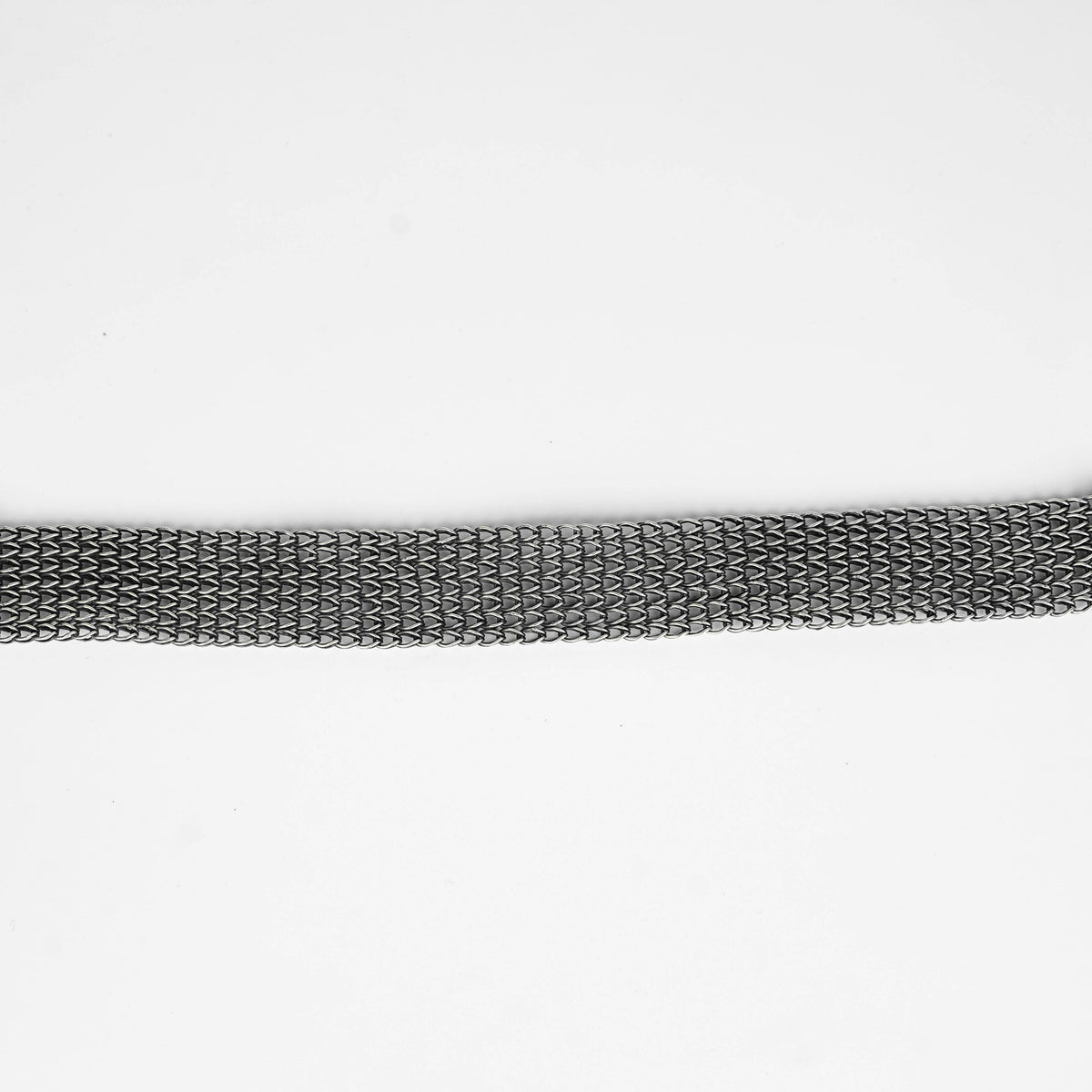 Silver oxidized tribal motif necklace worn on model