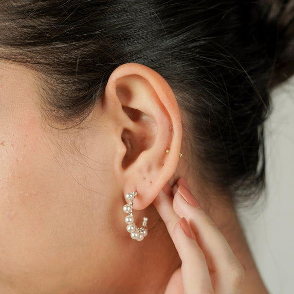Model wearing Silver Pearl Hoops earrings, versatile jewelry accessory