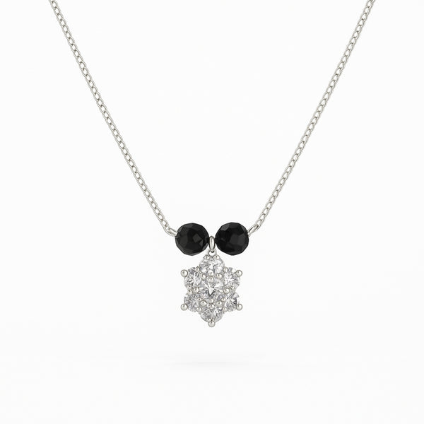 Silver floral pendant necklace with black beads and CZ stones