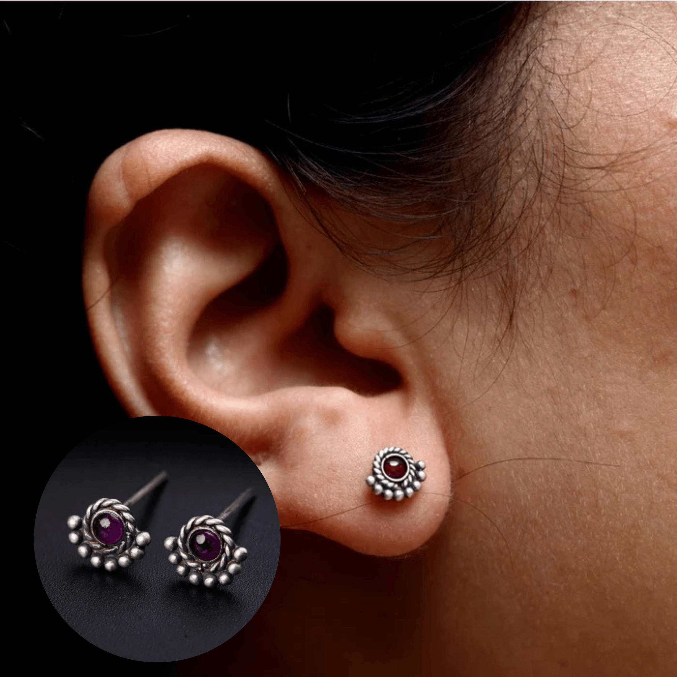 Silver earrings with red gemstone