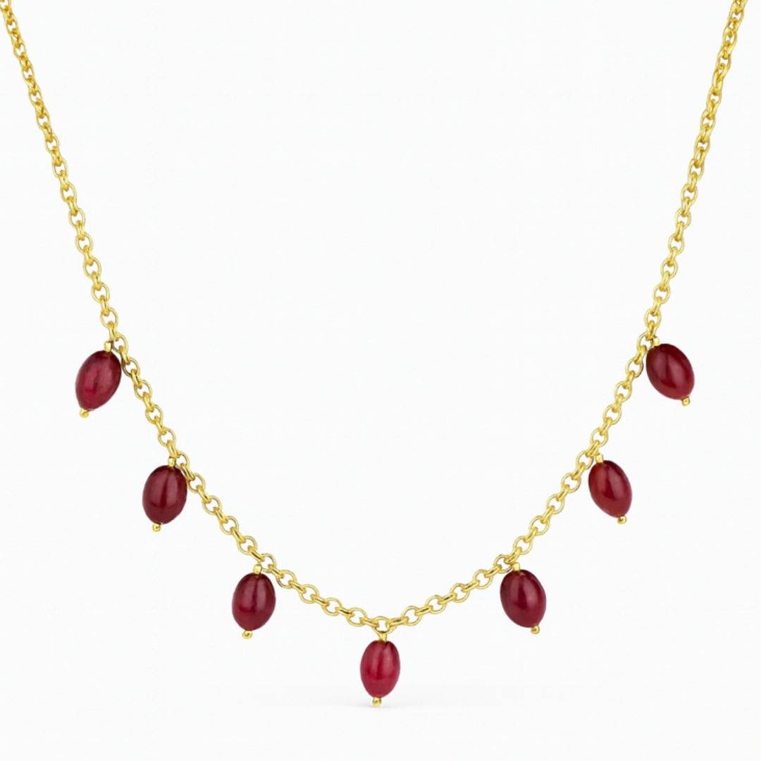 Gold chain with red ruby beads for jewelry