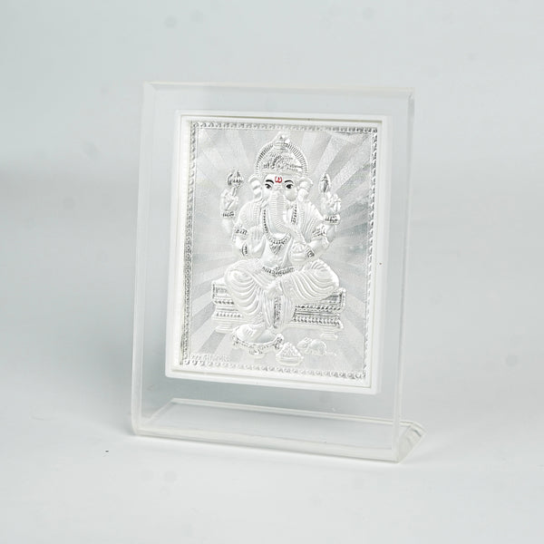 Close-up of Ganapati silver frame with detailed engraving for house decoration