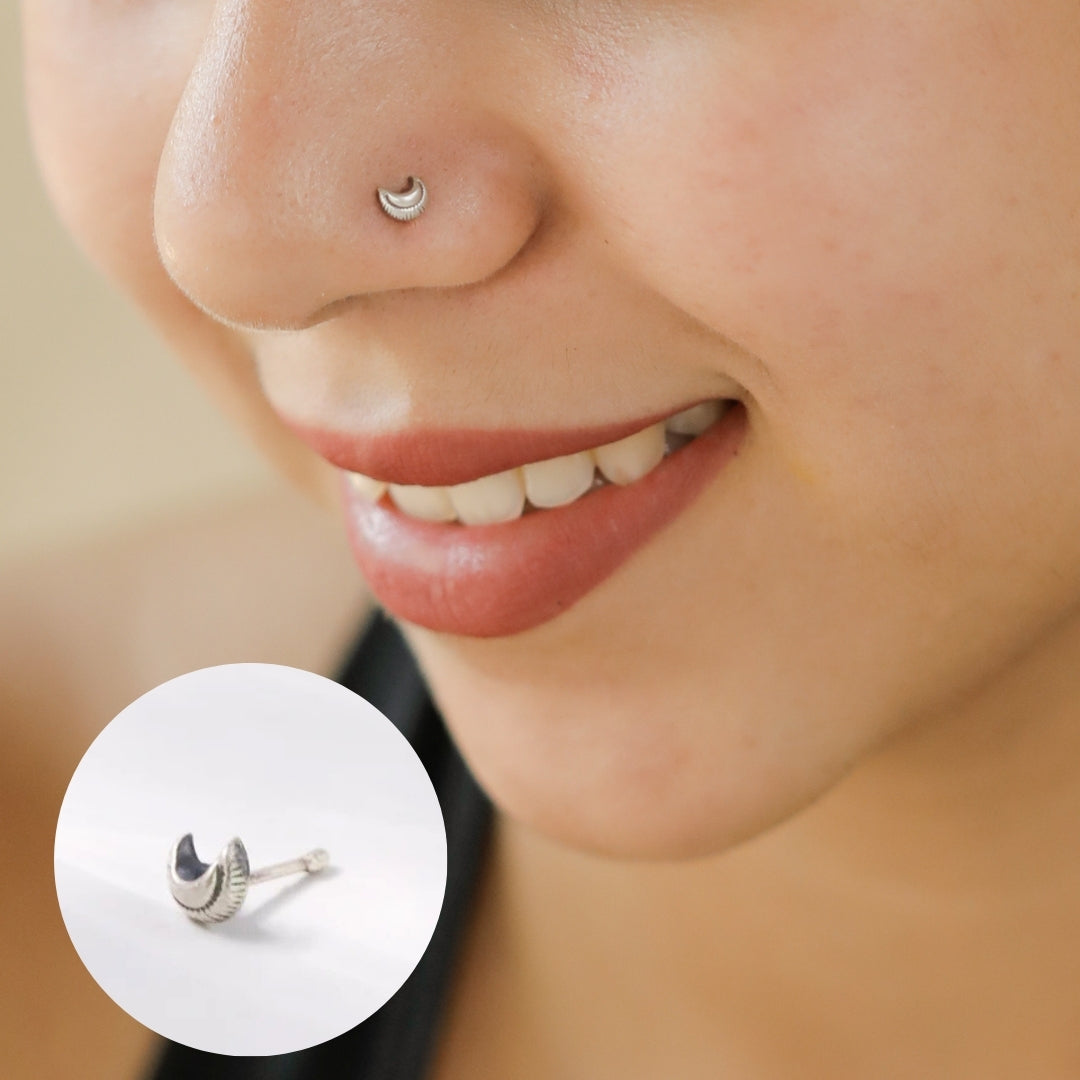 Close-up of Silver Tiny Textured Chandrakor Nose Pin texture detail