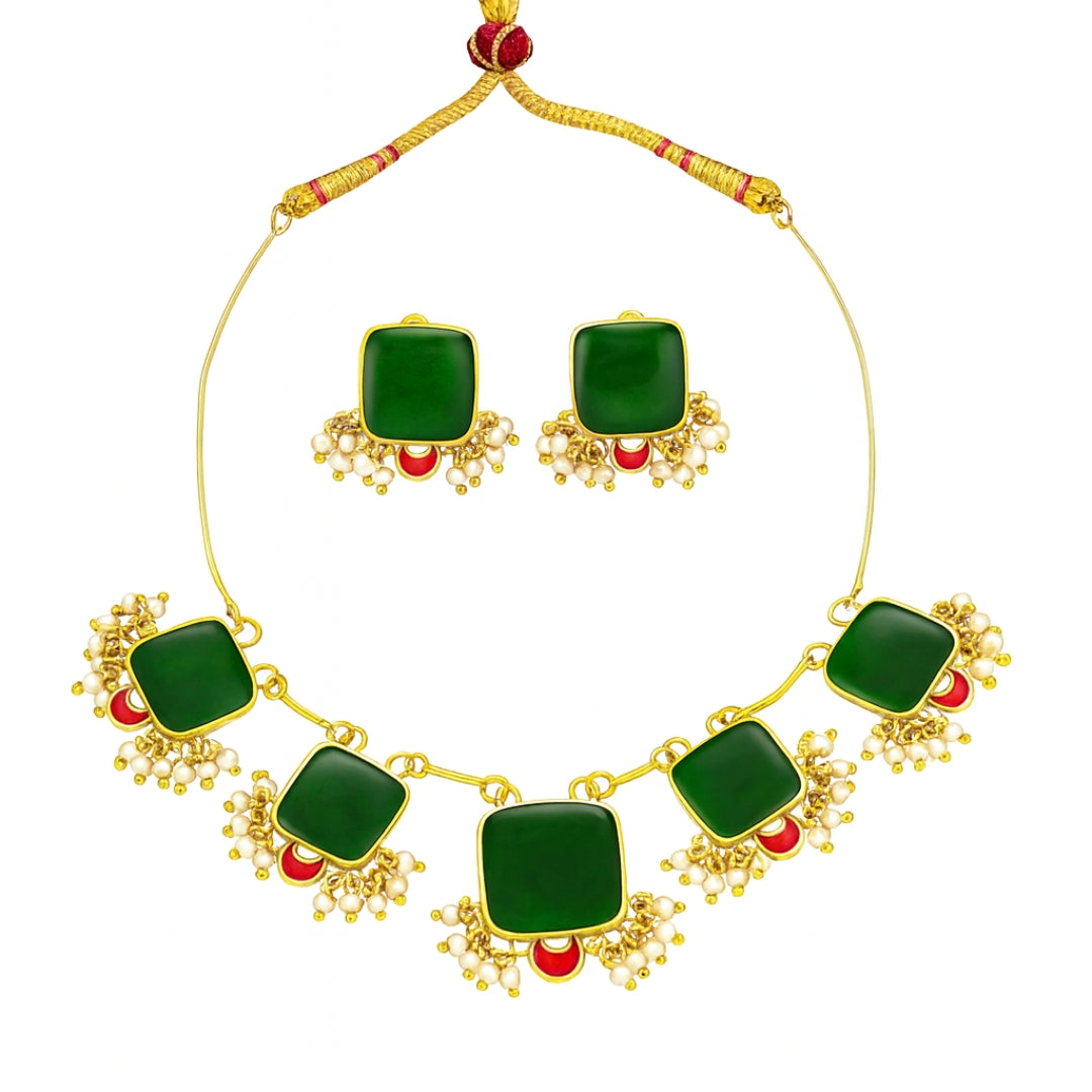 Gold-plated green meenakari jewelry set with pearl and red accents
