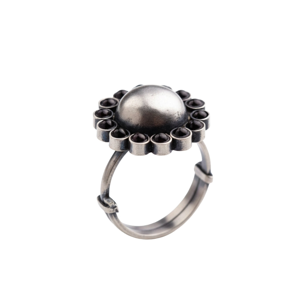Silver floral ring with black accents