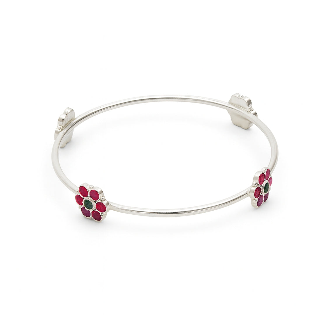 Silver floral bangle with pink and green enamel accents