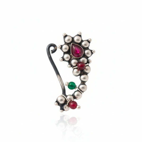 Maharashtrian Nath clip-on jewelry in sterling silver with red, green, and pink stones