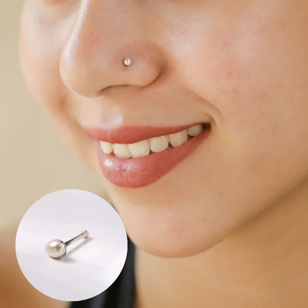 Close-up of Silver Tiny Nose Pin with polished finish