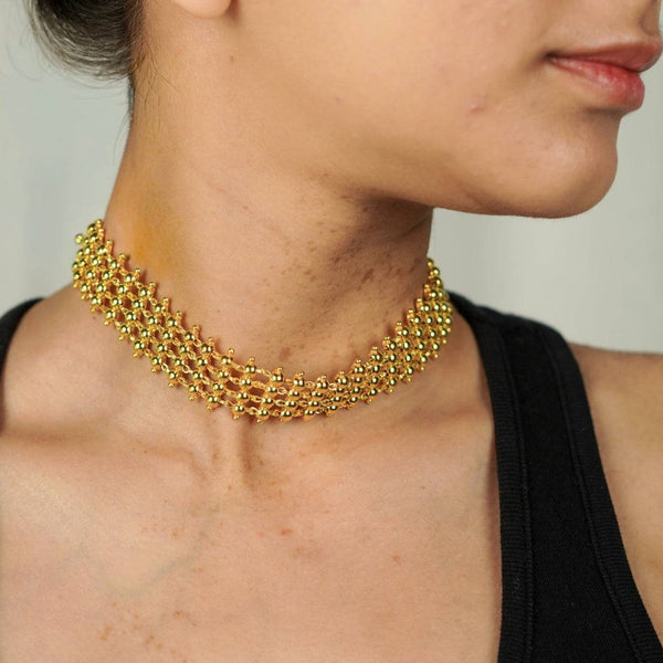 Gold plated pearl necklace on model