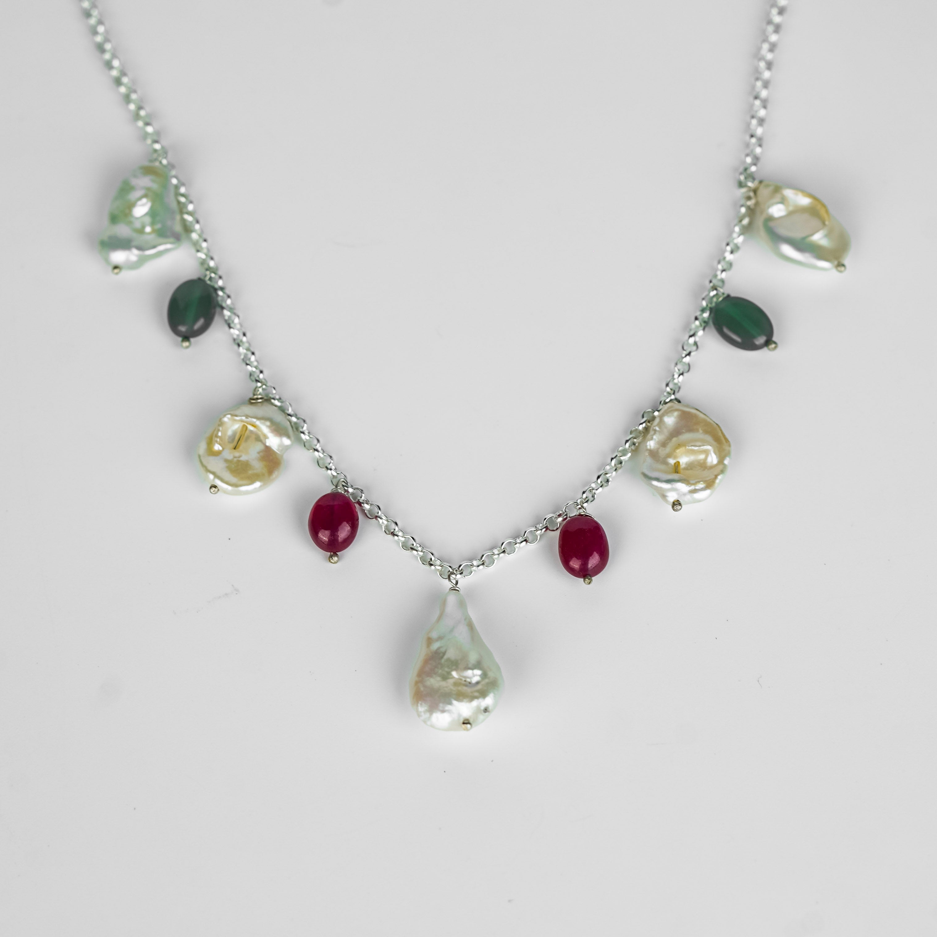 Silver necklace with pearls and colorful gemstones