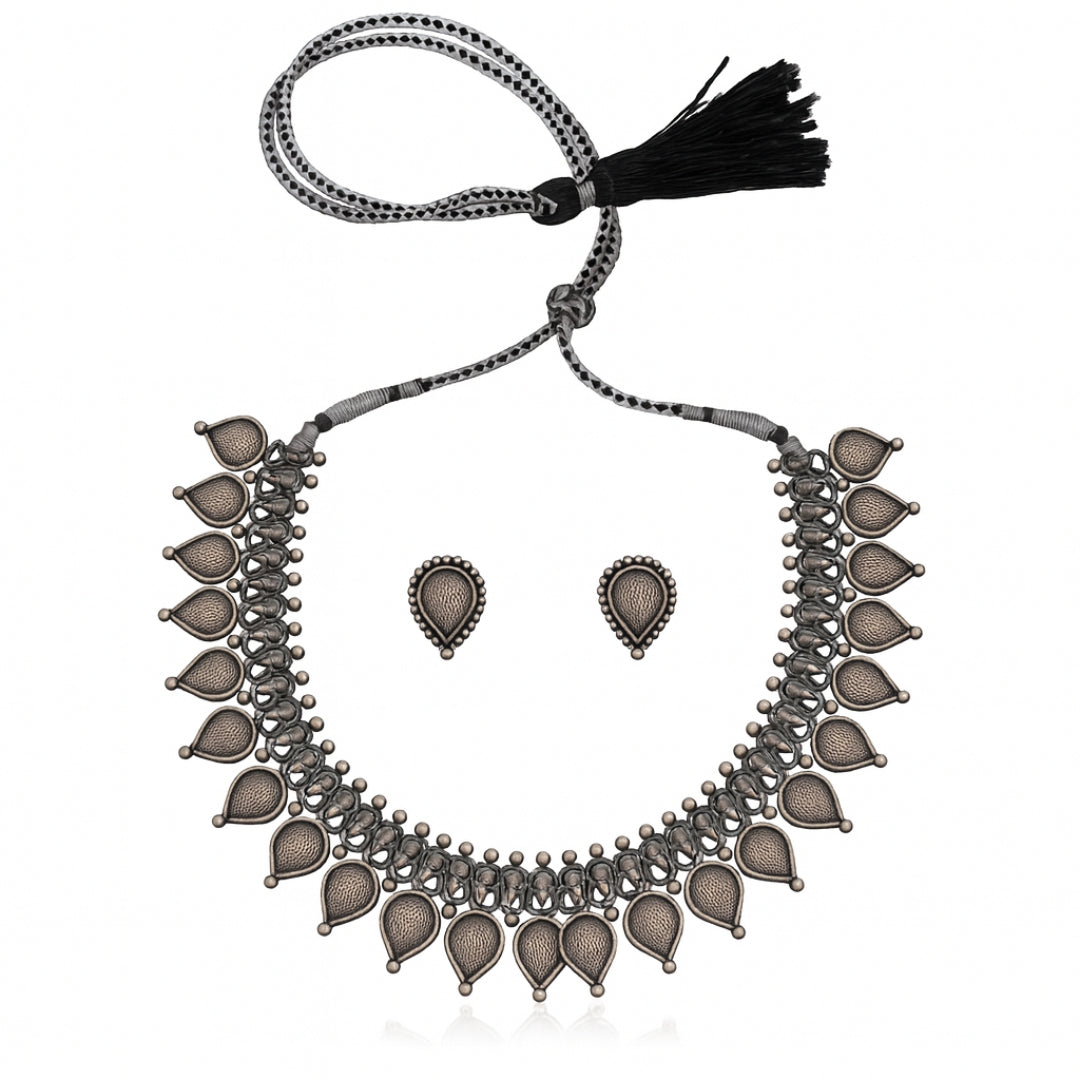 Silver necklace and earrings set with drop motifs and black tassel for women