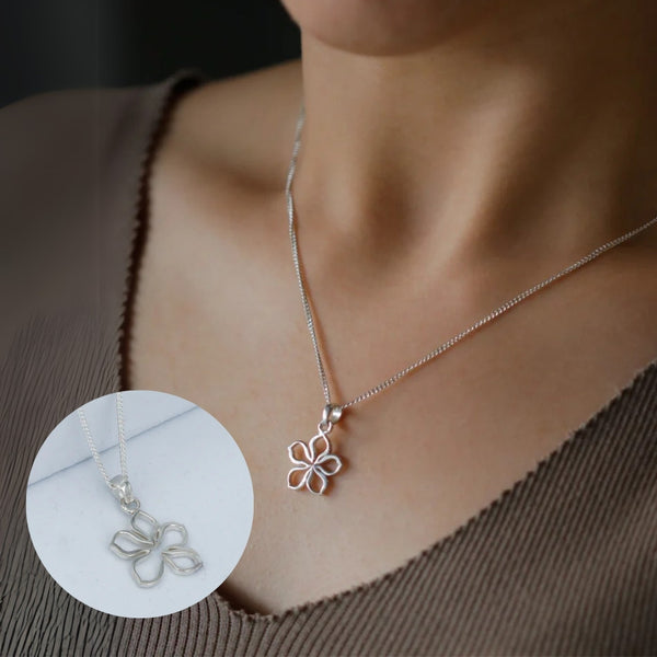 Floral silver charm necklace design