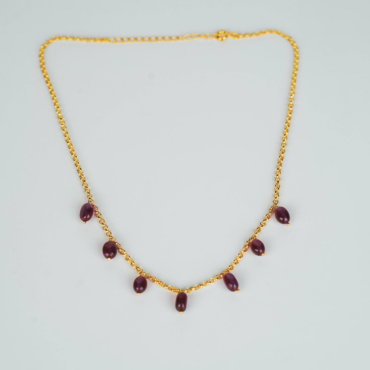 Gold chain with ruby beads for jewelry