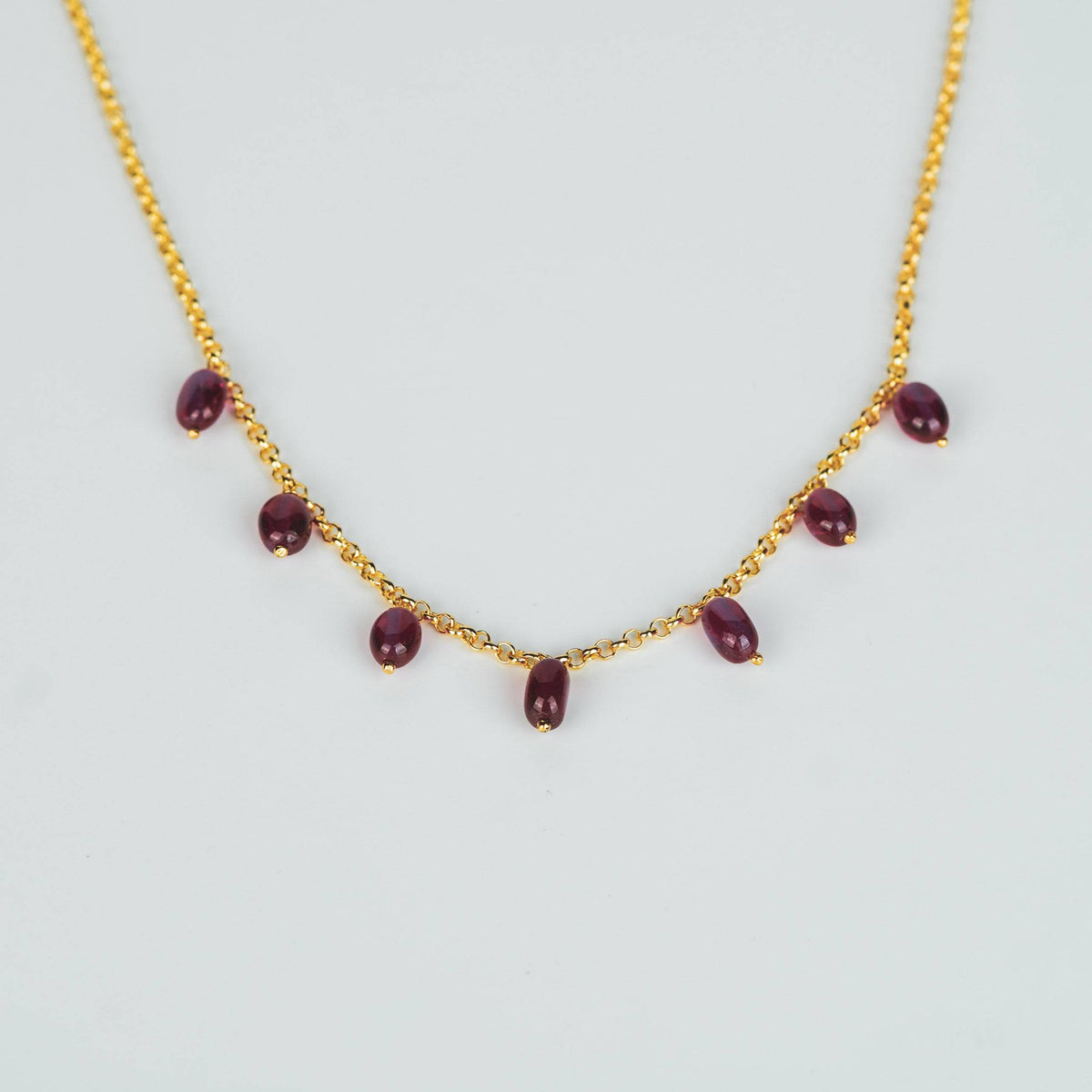 Gold chain with ruby beads for jewelry