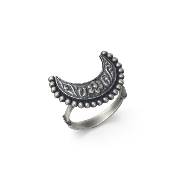 Silver crescent moon ring with floral and swirl engravings, handcrafted jewelry