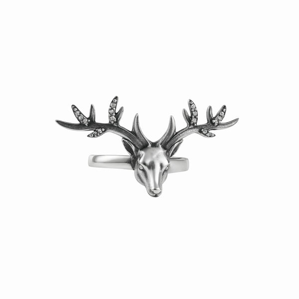 Silver deer motif ring with detailed antlers and sparkling stones