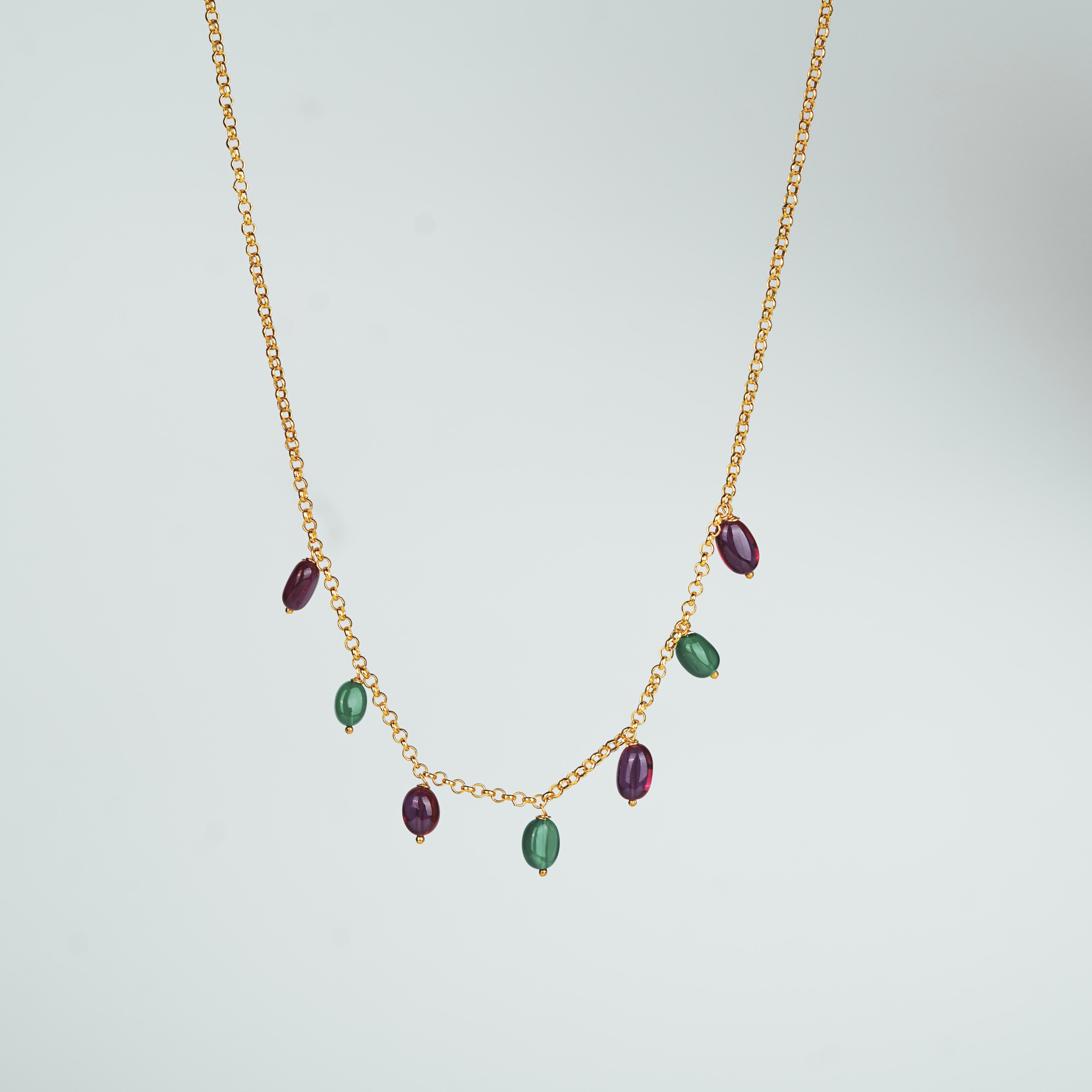 Gold chain with red and green gemstone beads for jewelry category