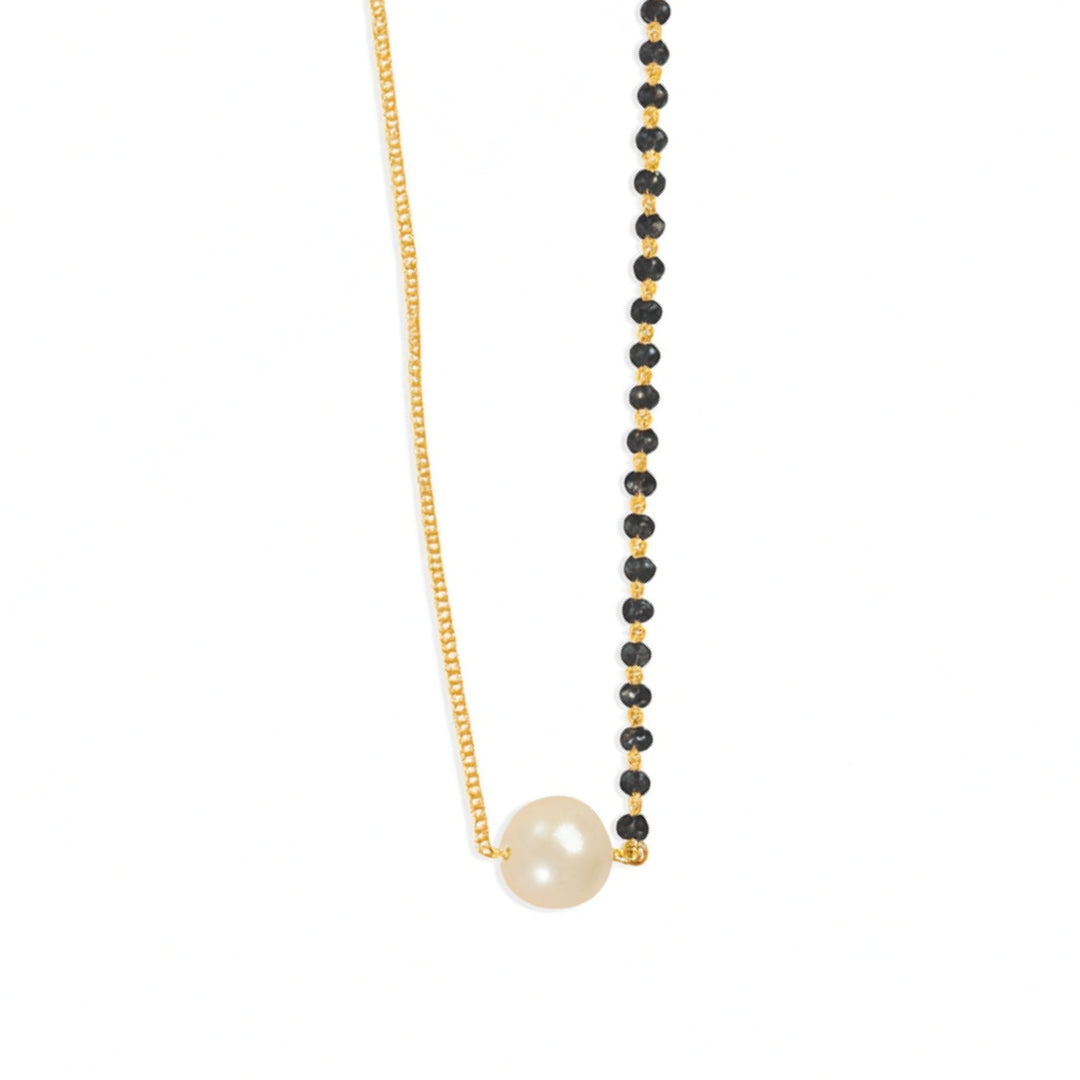 Pearl and black bead necklace with gold chain