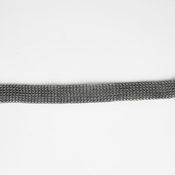 Close-up of silver oxidized necklace chain