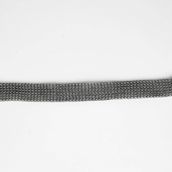Close-up of silver oxidized necklace chain