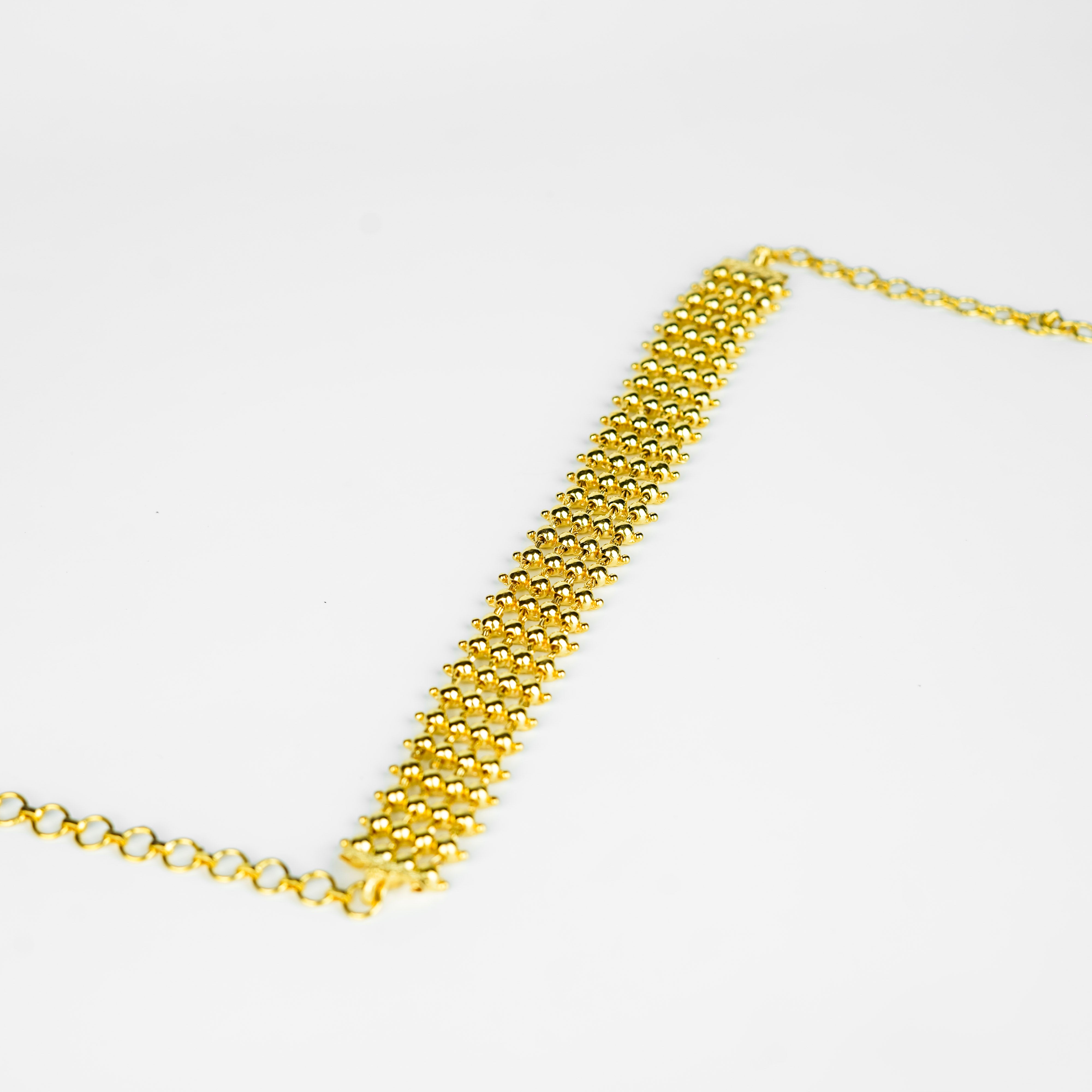 Gold plated silver choker necklace with intricate bead design