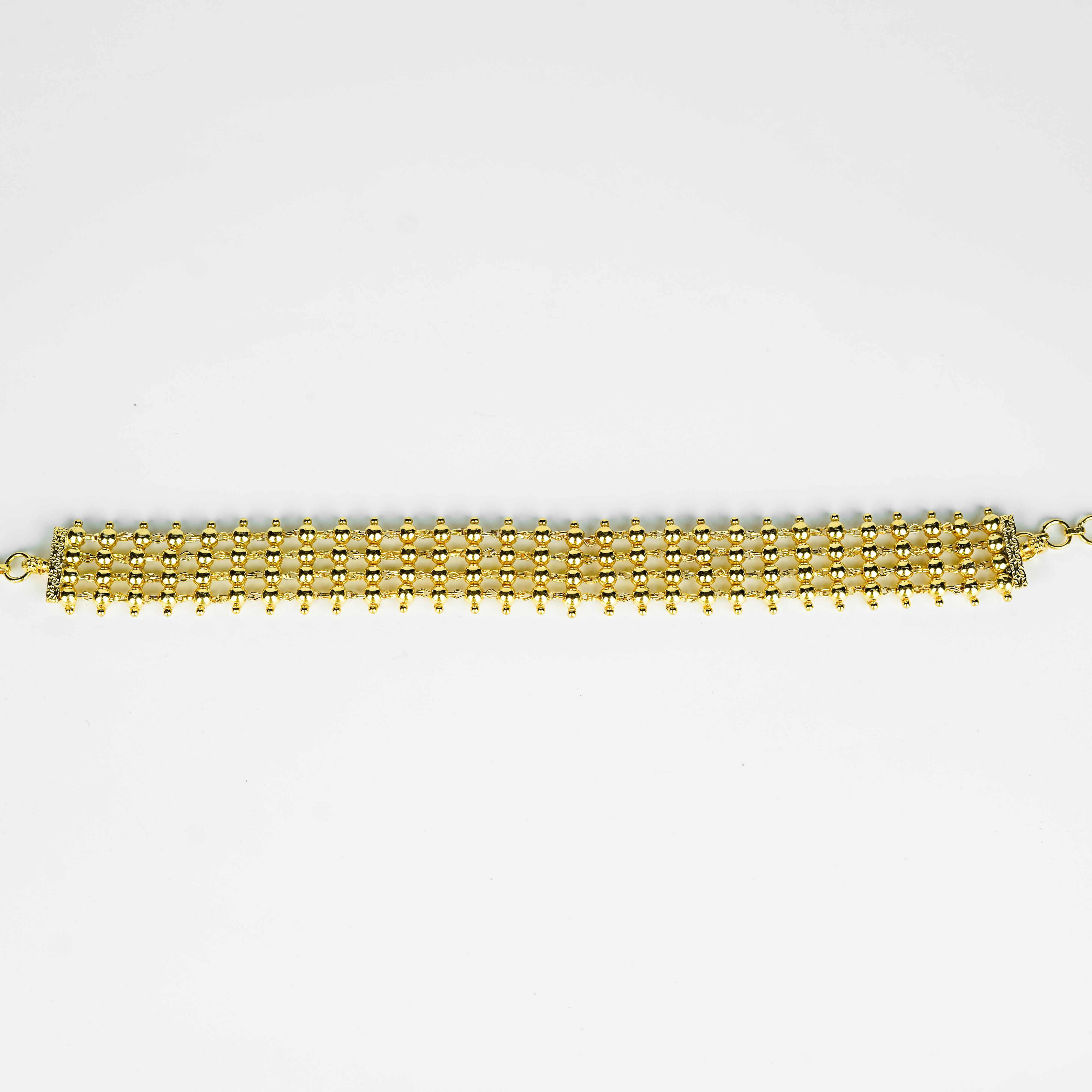 Gold plated pearl choker jewelry close-up