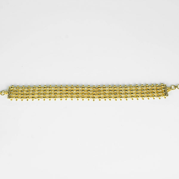 Gold plated pearl choker jewelry close-up