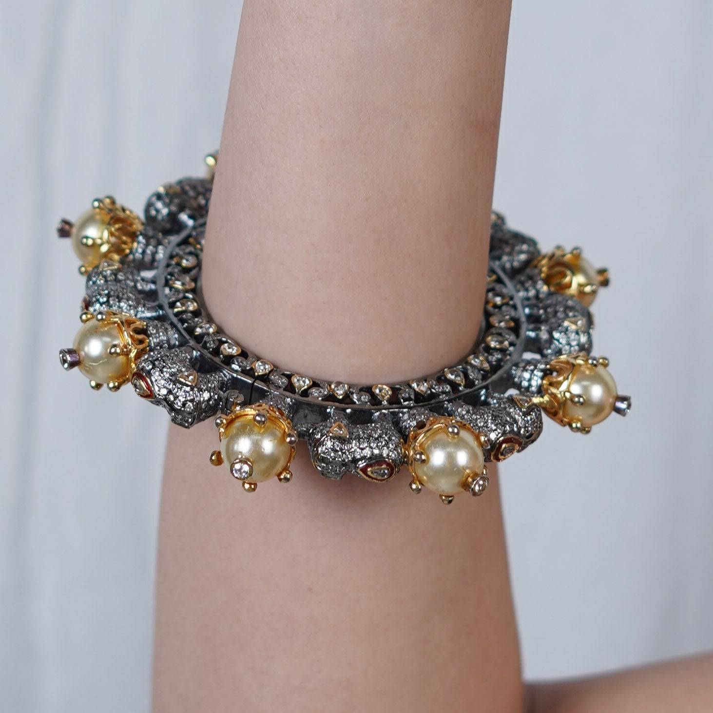 Model wearing 22K Gold Plated Fashion Bangle (Single) for a sophisticated and elegant jewellery look