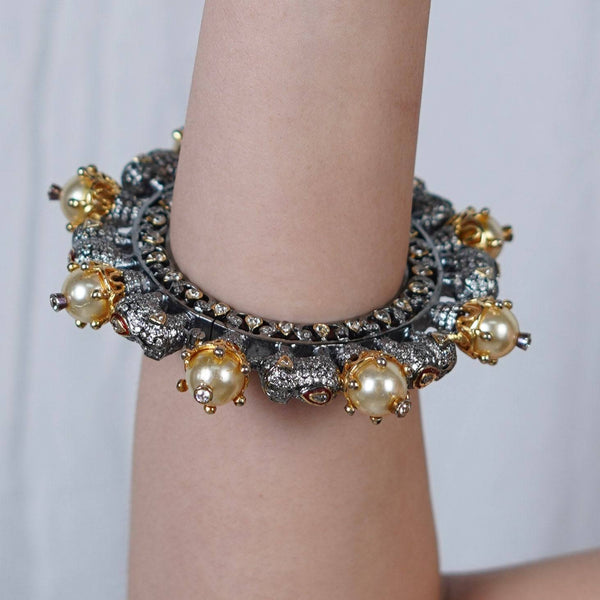 Model wearing 22K Gold Plated Fashion Bangle (Single) for a sophisticated and elegant jewellery look