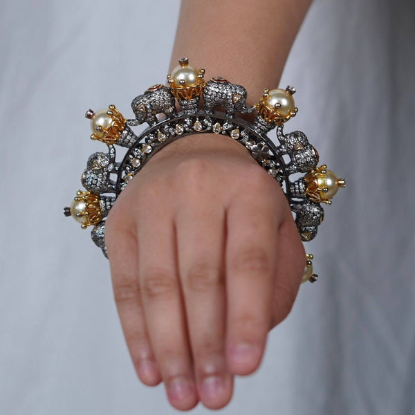 Model wearing 22K Gold Plated Fashion Bangle (Single) for a sophisticated and elegant jewellery look