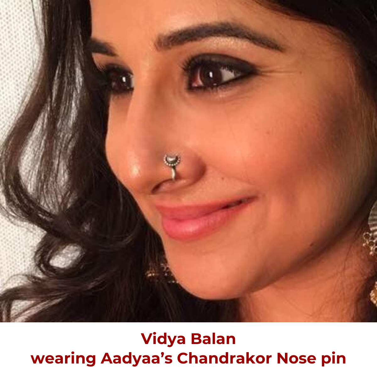 a close up of a person with a nose ring