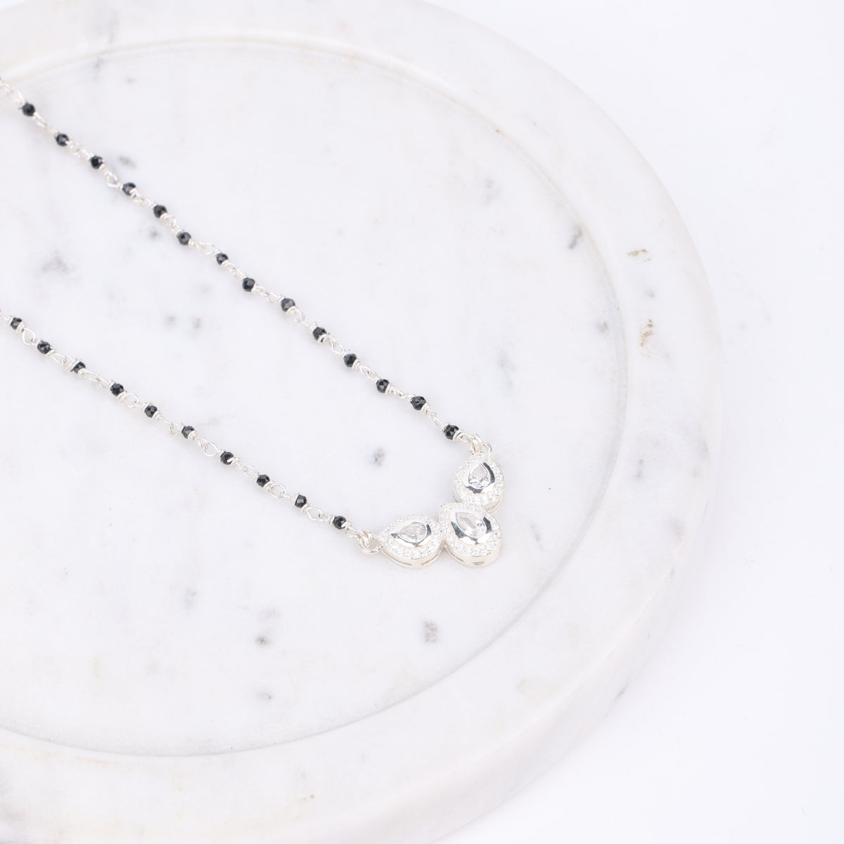 Silver CZ Petal Necklace with Black Spinel