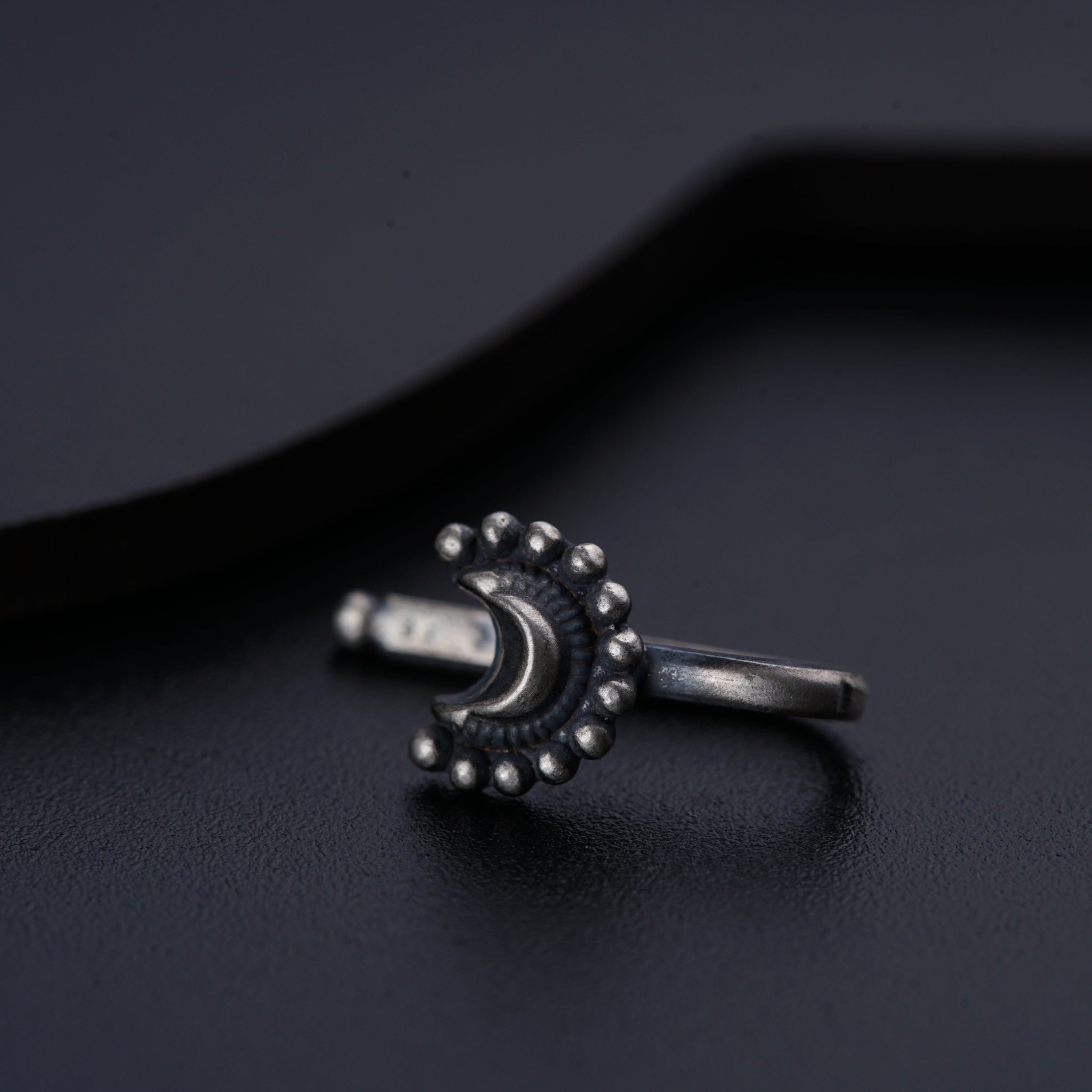 a close up of a ring on a table