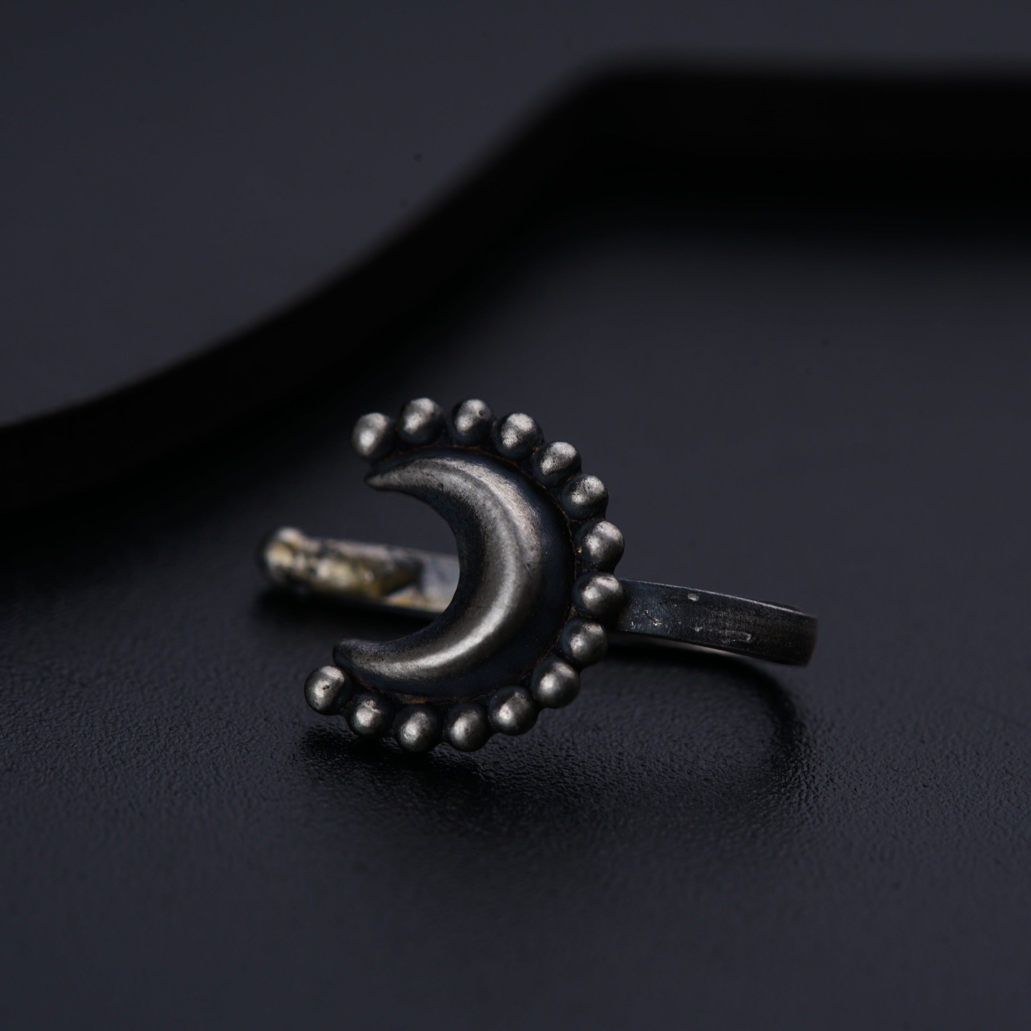 a close up of a ring on a table