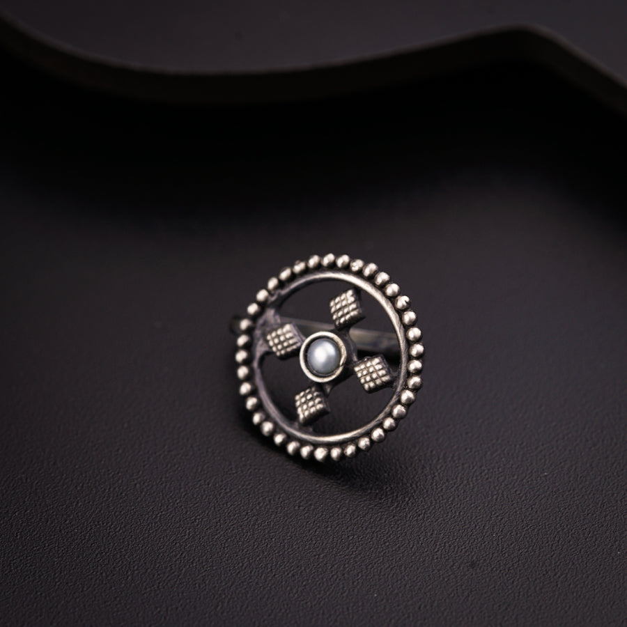 a close up of a button on a black surface