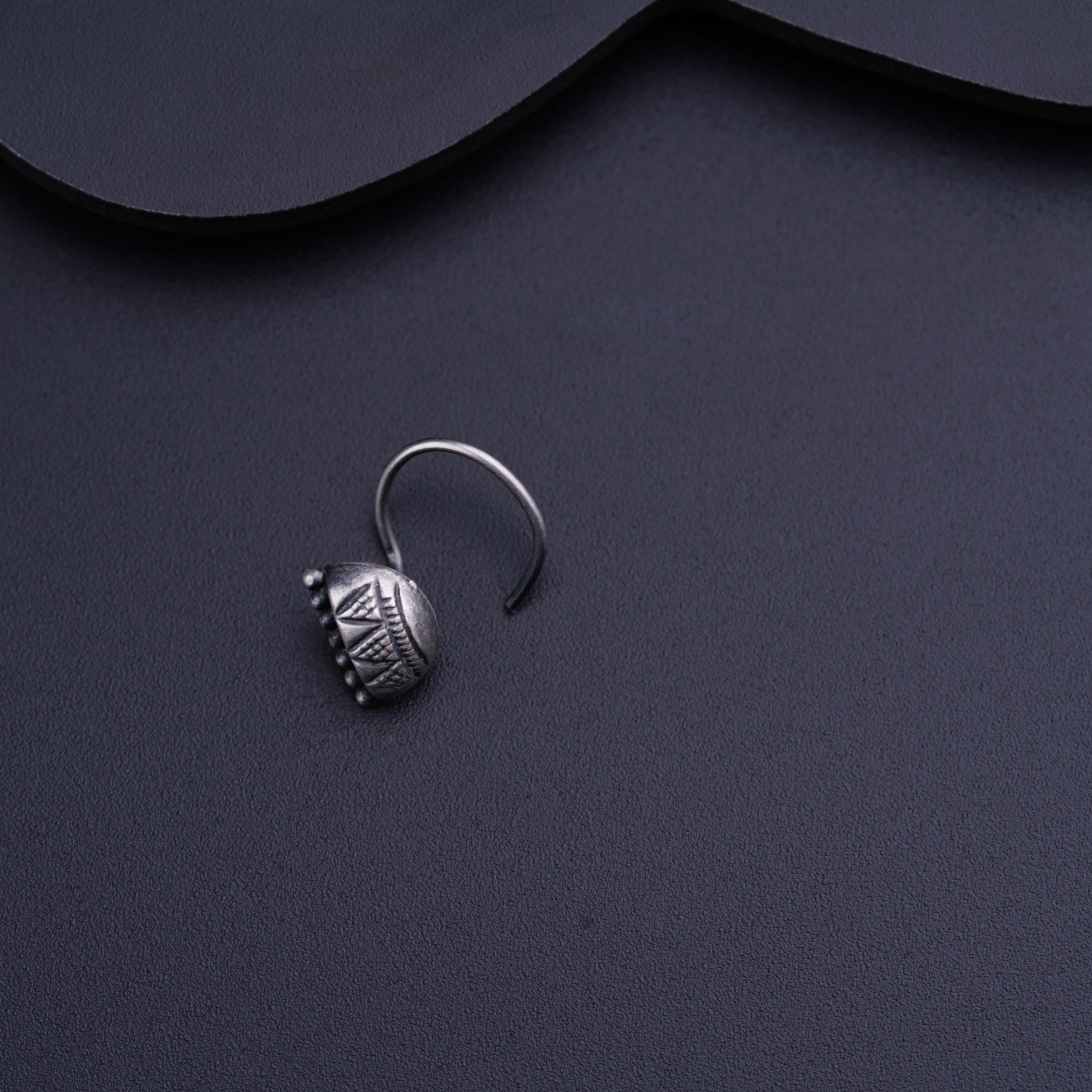 a close up of a ring on a table