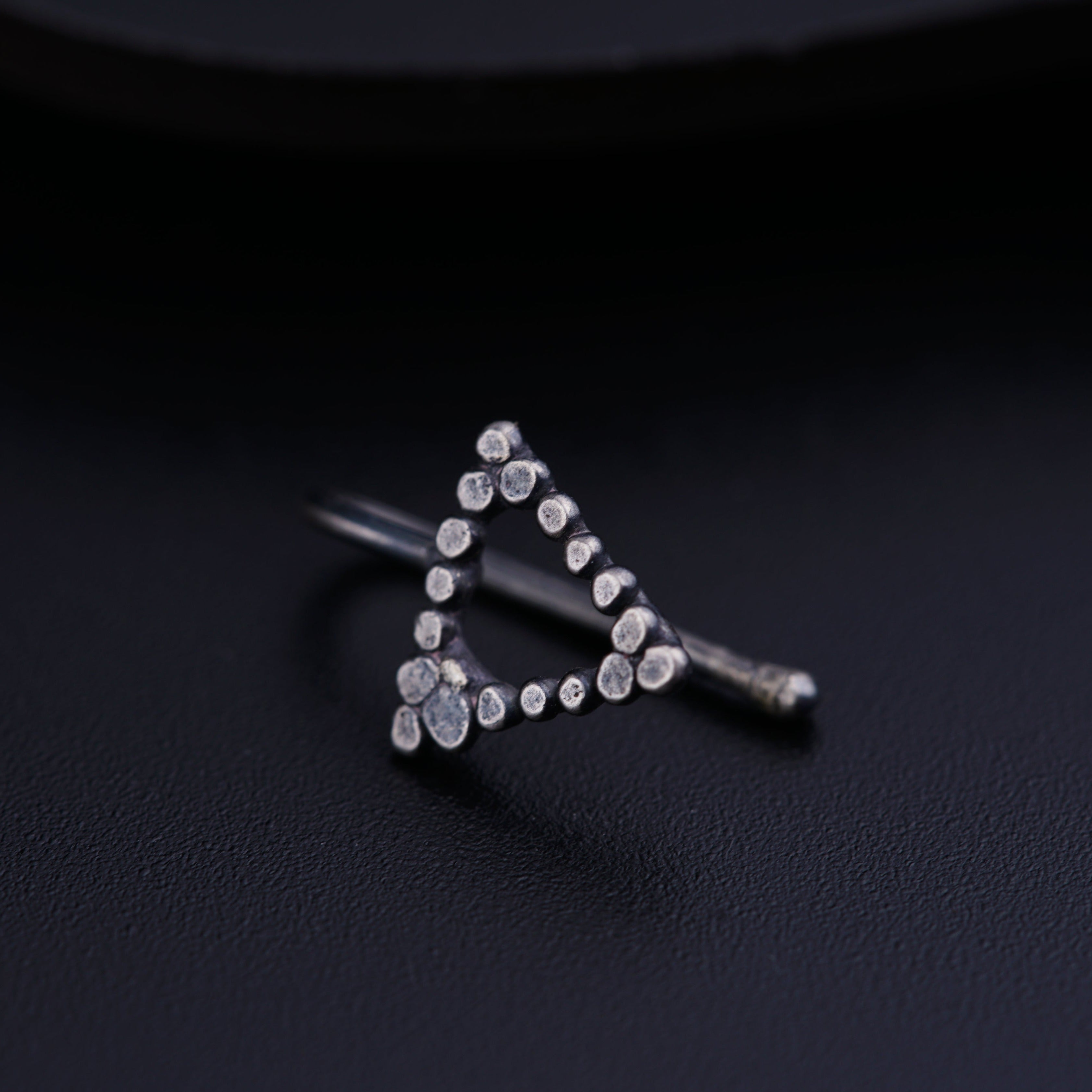 a close up of a pair of scissors on a table