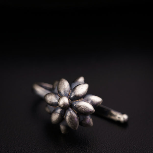 a close up of a metal object on a table