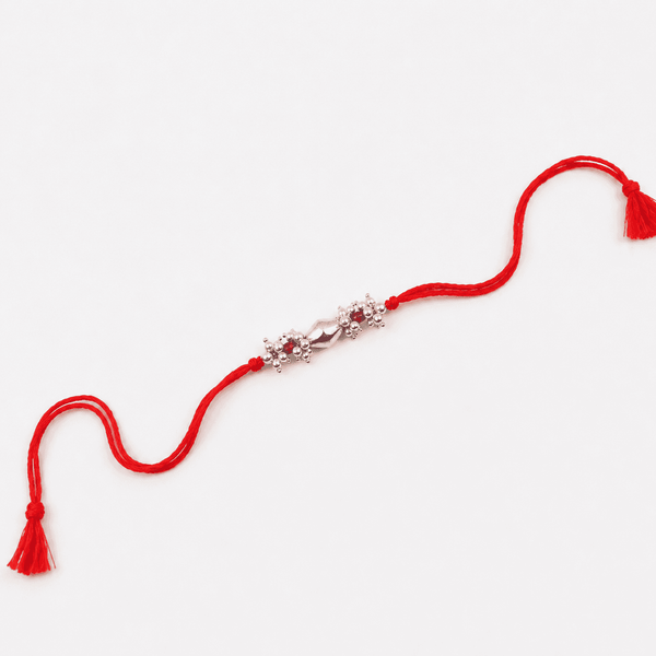 Ruby and pearl gemstone Rakhi with traditional silver Dholki beads