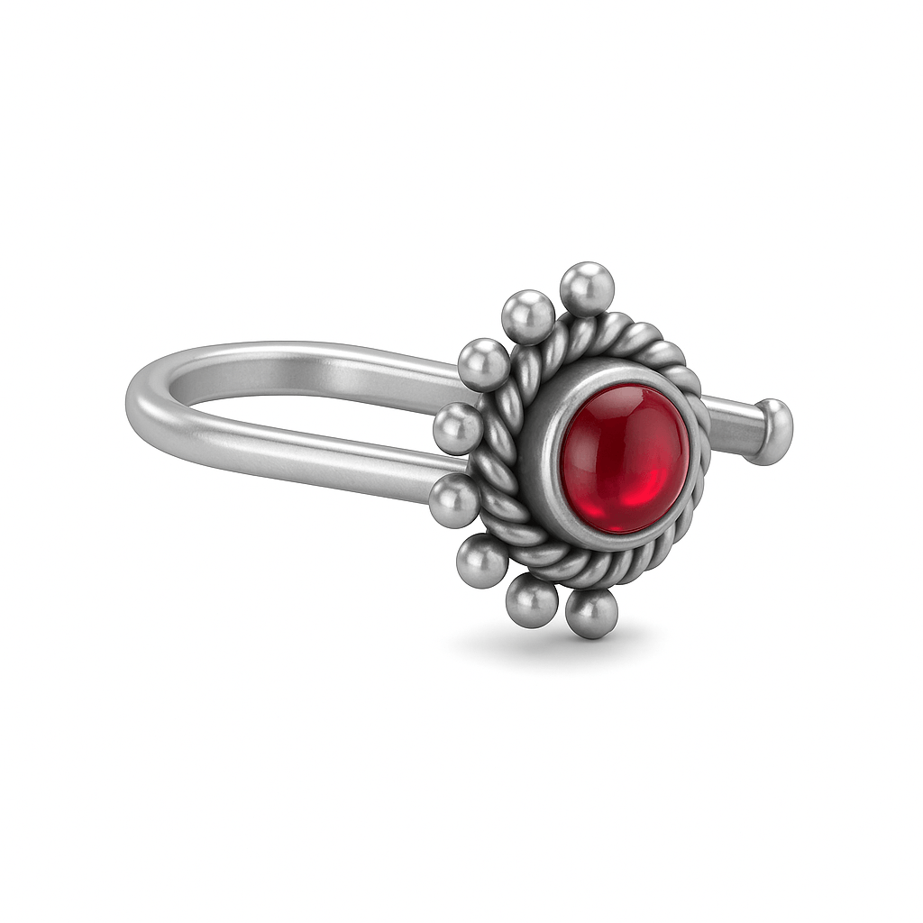 Silver Chandrika Nosepin with red gemstone and intricate design