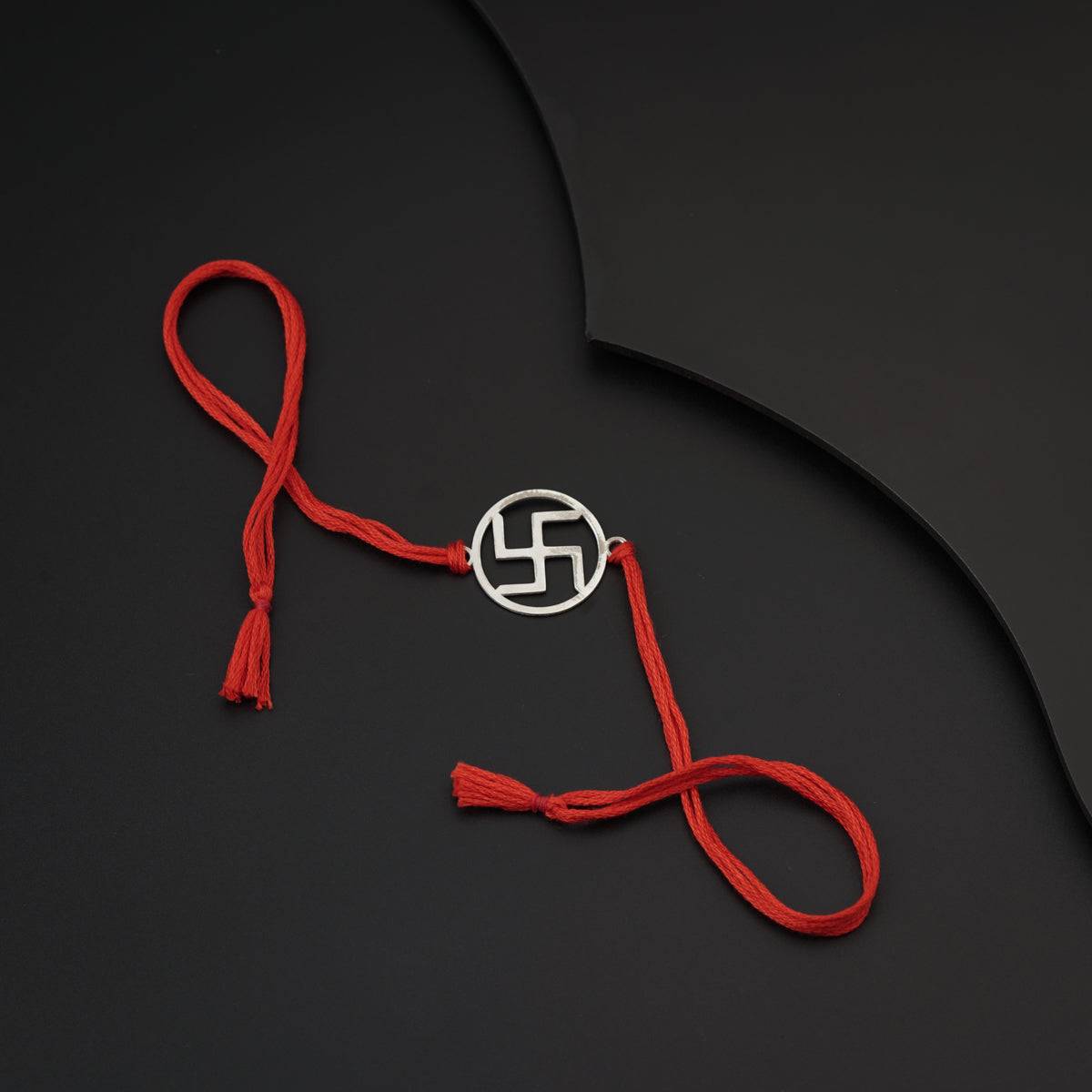 Silver Laser cut Swastik Rakhi: Big