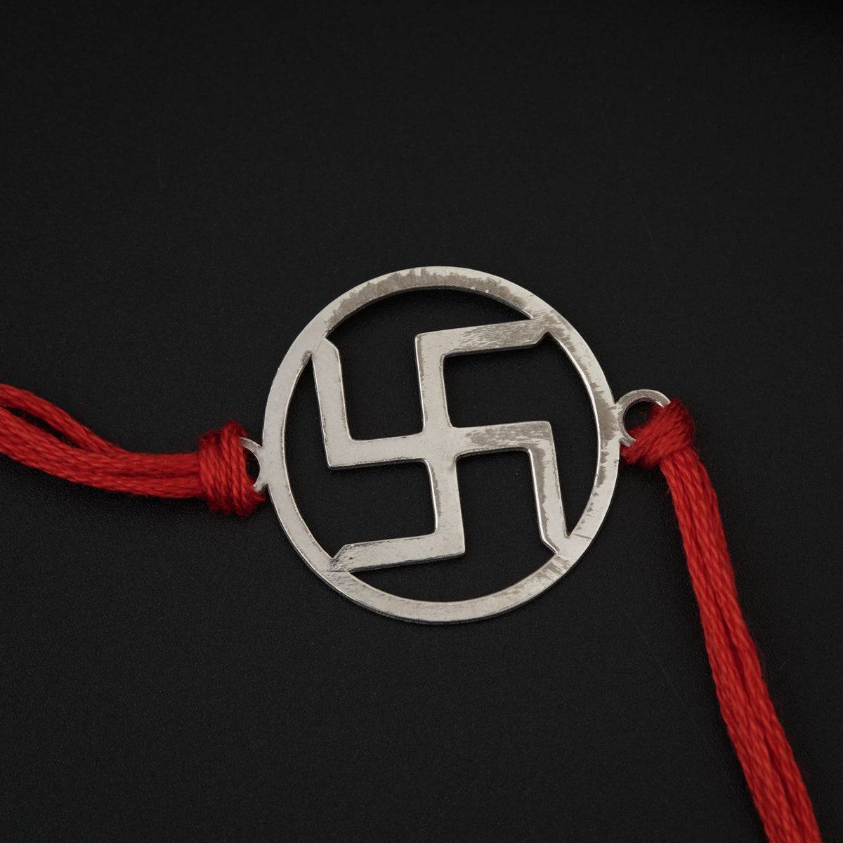 Silver Laser cut Swastik Rakhi: Big