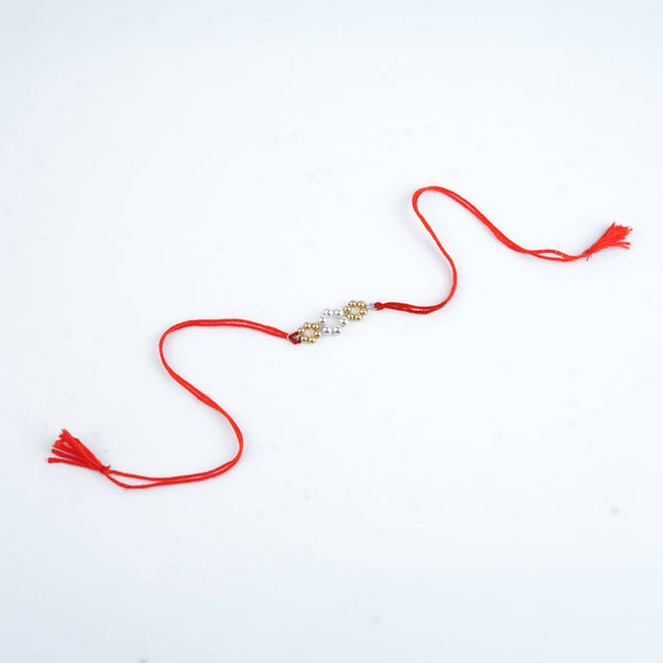 Golden & White Pearl Handmade Silver Rakhi