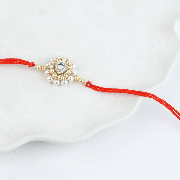 CZ Drop, Golden & White Pearl Handmade Silver Rakhi