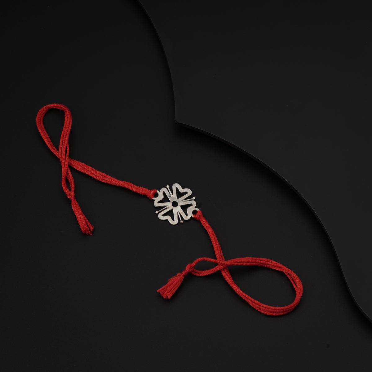 Silver Laser cut Flower Rakhi