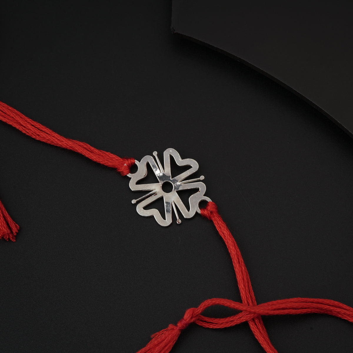 Silver Laser cut Flower Rakhi