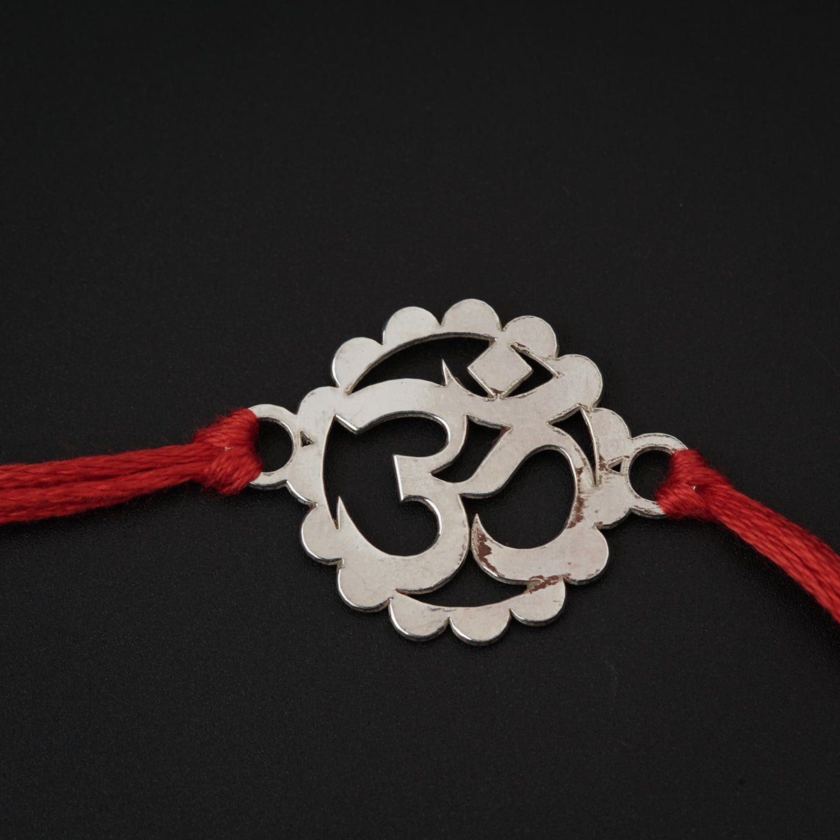Silver Laser cut Om Rakhi: Small