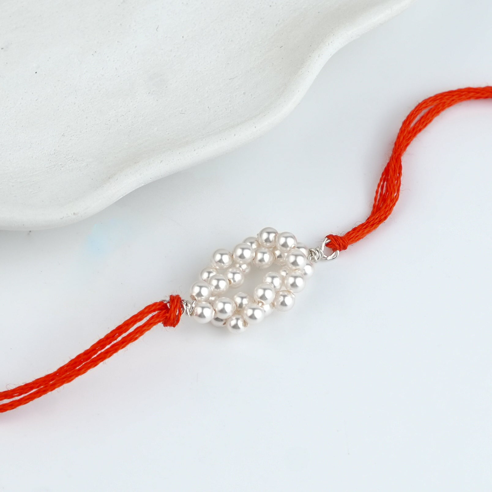Twisted Pearl Handmade Silver Rakhi
