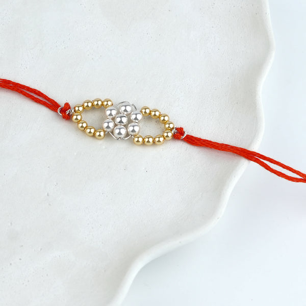 Golden & White Pearl Handmade Silver Rakhi