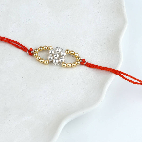Golden & White Pearl Handmade Silver Rakhi